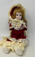 Load image into Gallery viewer, Red Dress Bonnet Lace Trim Yellow Buttons 16 Inch Collectible Porcelain Doll
